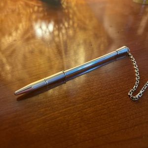 Beautiful and chic Hermes sterling silver agenda / bag pen.